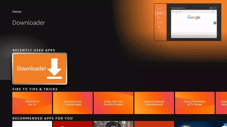Pantalla de inicio del Fire TV Stick con la aplicación Downloader en aplicaciones recientes